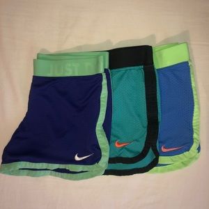 Three pairs of Nike athletic shorts